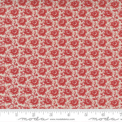 a small floral in red on dark cream