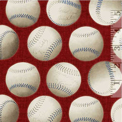 Baseballs on red fabric