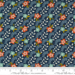 a diagonal floral print fabric on dark blue